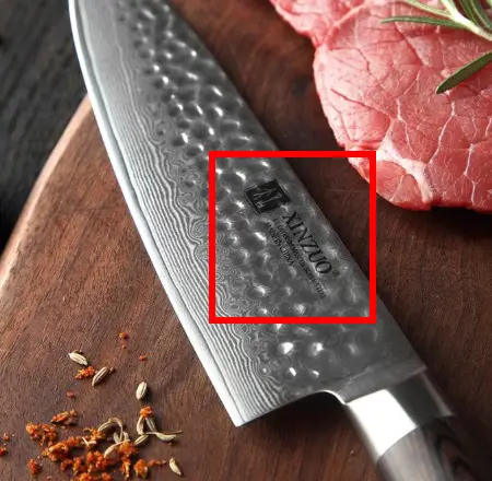 Screenshot from Kizaru.com showing A knife with another brand name etched on it
