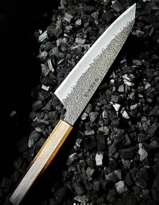 A version of Homura kengata-gyuto knife